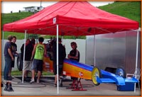 Mark Vincent top Alcohol Dragster under the awning