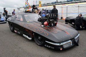 Marcus Hilt's sinister looking Trouble Racing Corvette Pro Mod in the staging lanes