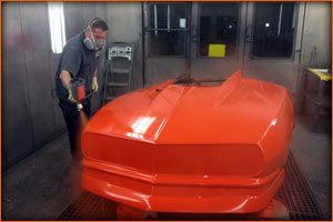 The new orange paint goes on at Maaco of Hagerstown